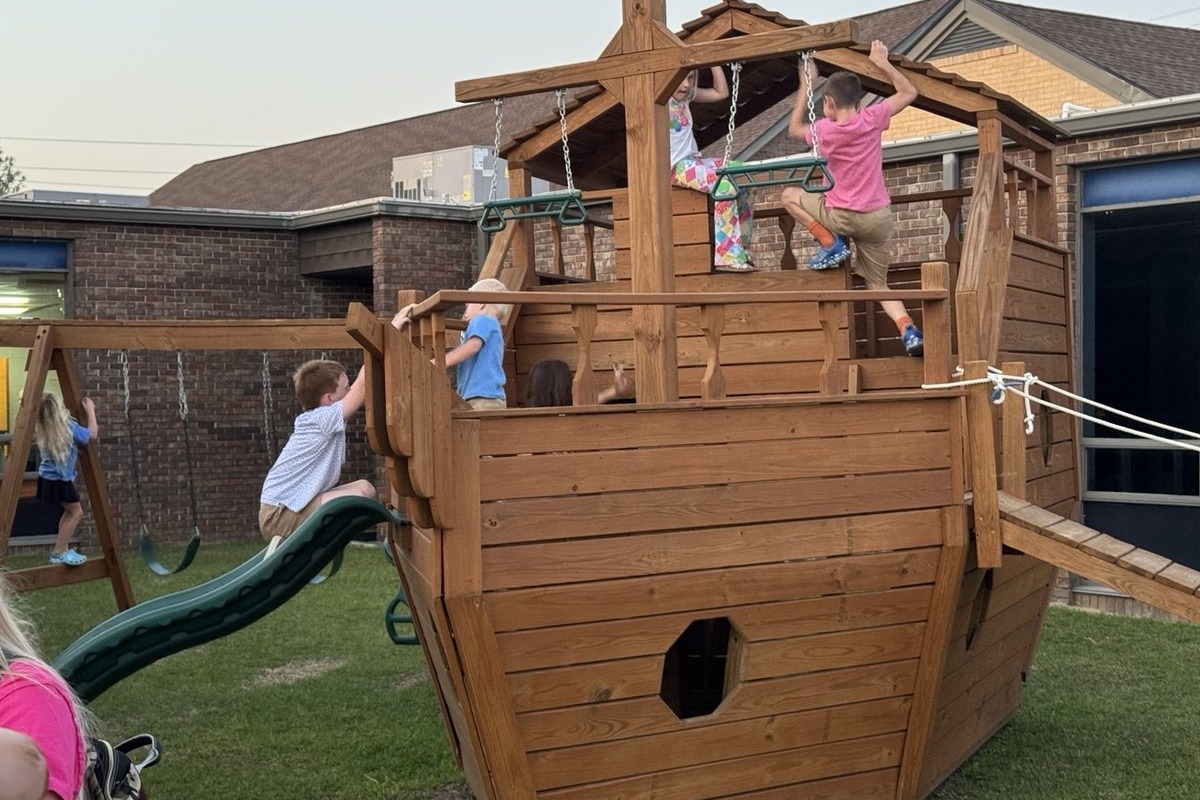 Children playing on Noah's Ark playground
